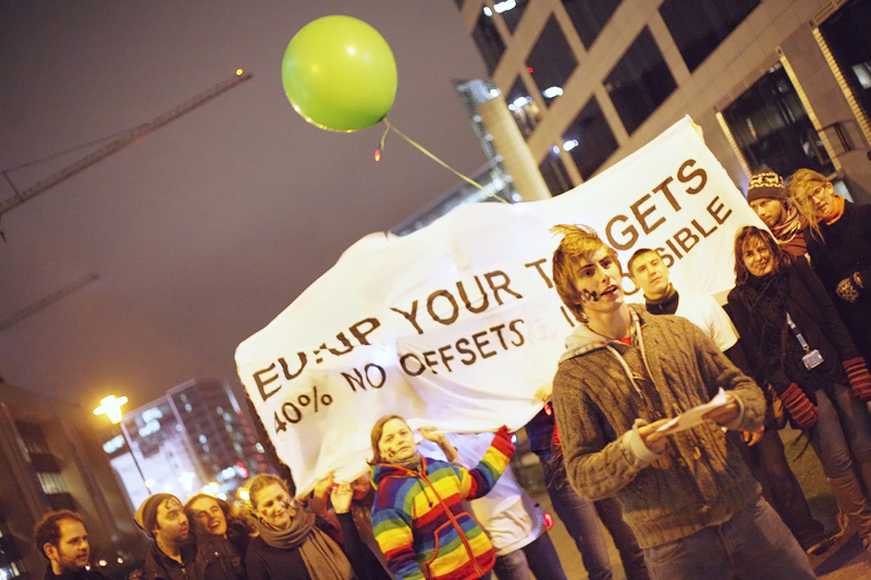 European youth demand stronger emissions reduction targets, 40% in line with science, during an action outside the EU <br />heads of state summit at the time of the COP17 Durban Climate Change Conference. Photo for Young Friends of the Earth Europe. <br />BELGIUM, Brussels | 2011